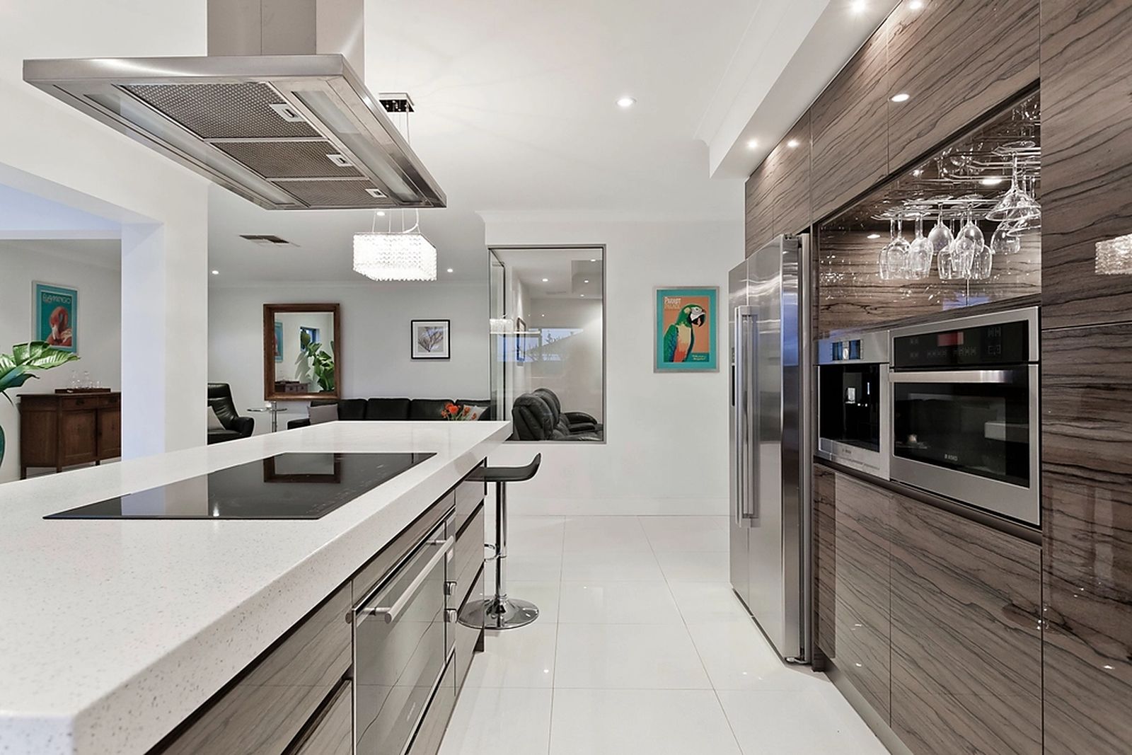 Modern kitchen with dark joinery and a stone island