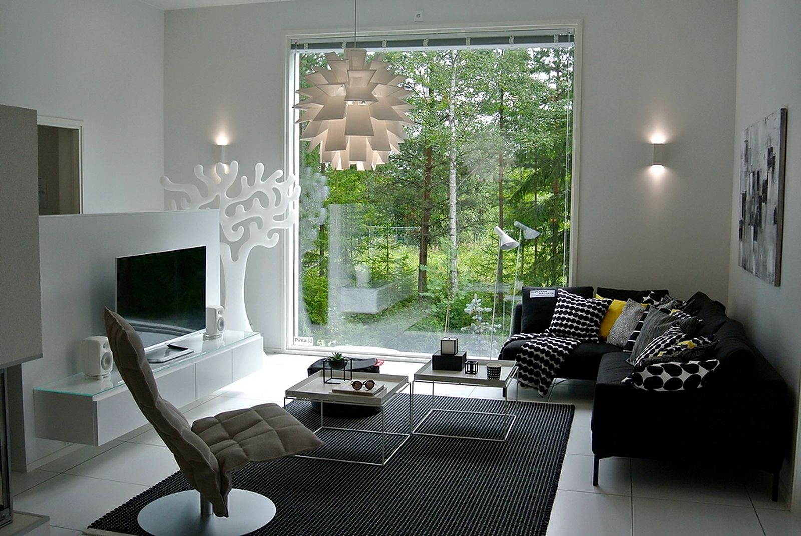 Warm contemporary living room with layered lighting